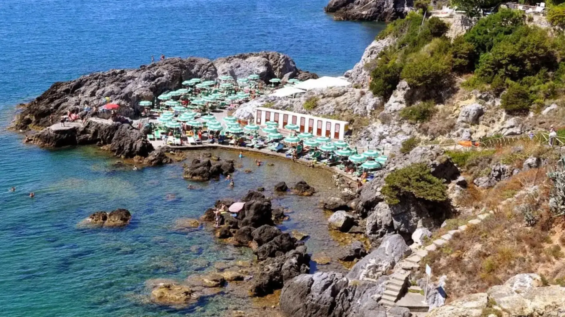 The rocky Maremma coastline with turquoise water